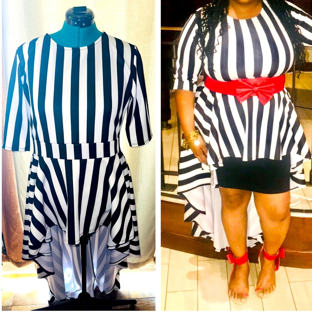 Women’s stripped peplum hi-low blouse with quarter inch sleeves. Sz 2xl